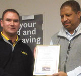 Branch chairman Raymond Cloete (r) hands the certificate of appreciation to Clint Viviers.